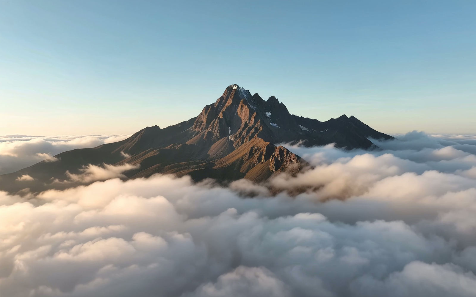Mountain peak above the clouds